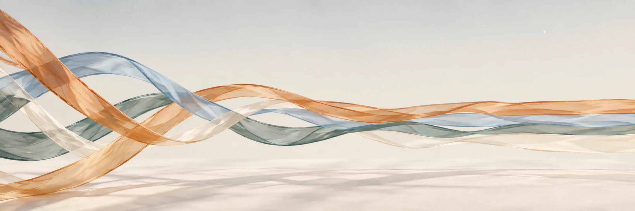 Sheer copper, blue, teal, and ivory ribbons weave together above a pale floor